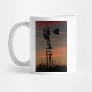 Christmas Sunset with a Windmill silhouette and clouds. Mug